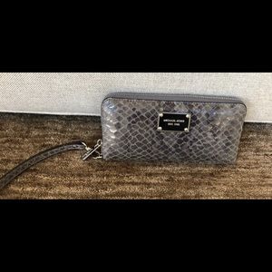 Michael Kors like new grey wristlet